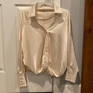 Silky batwing blouse with golden buttons